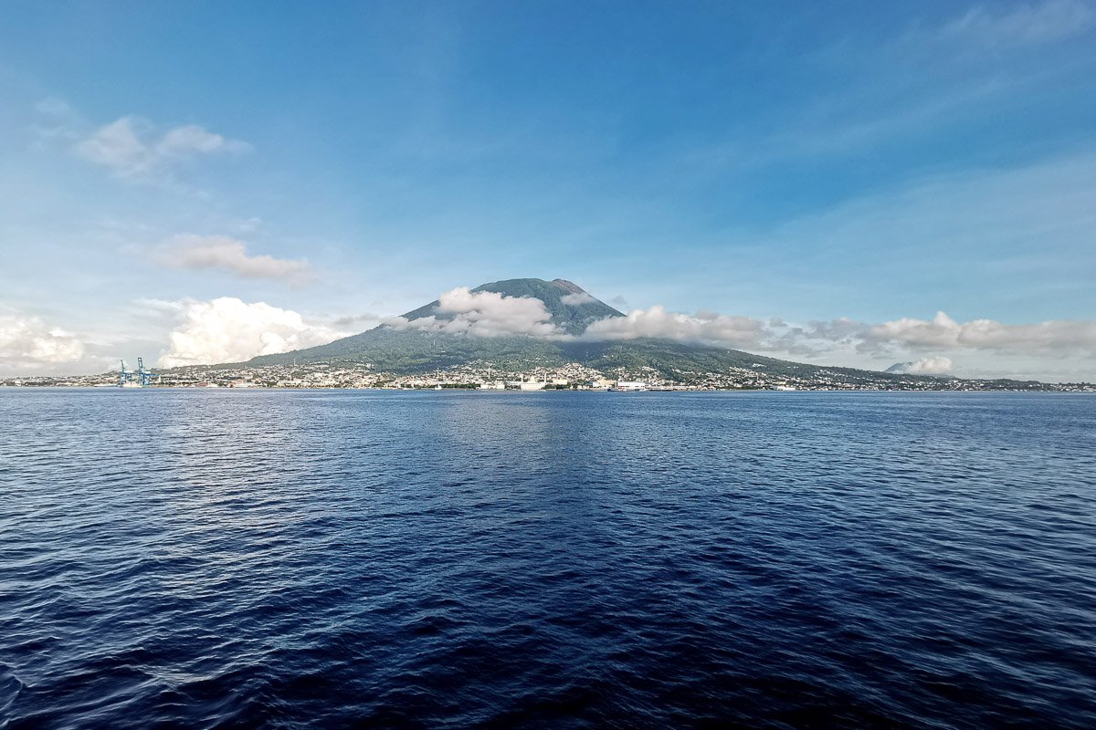 Diver over a coral reef in Halmahera, North Maluku