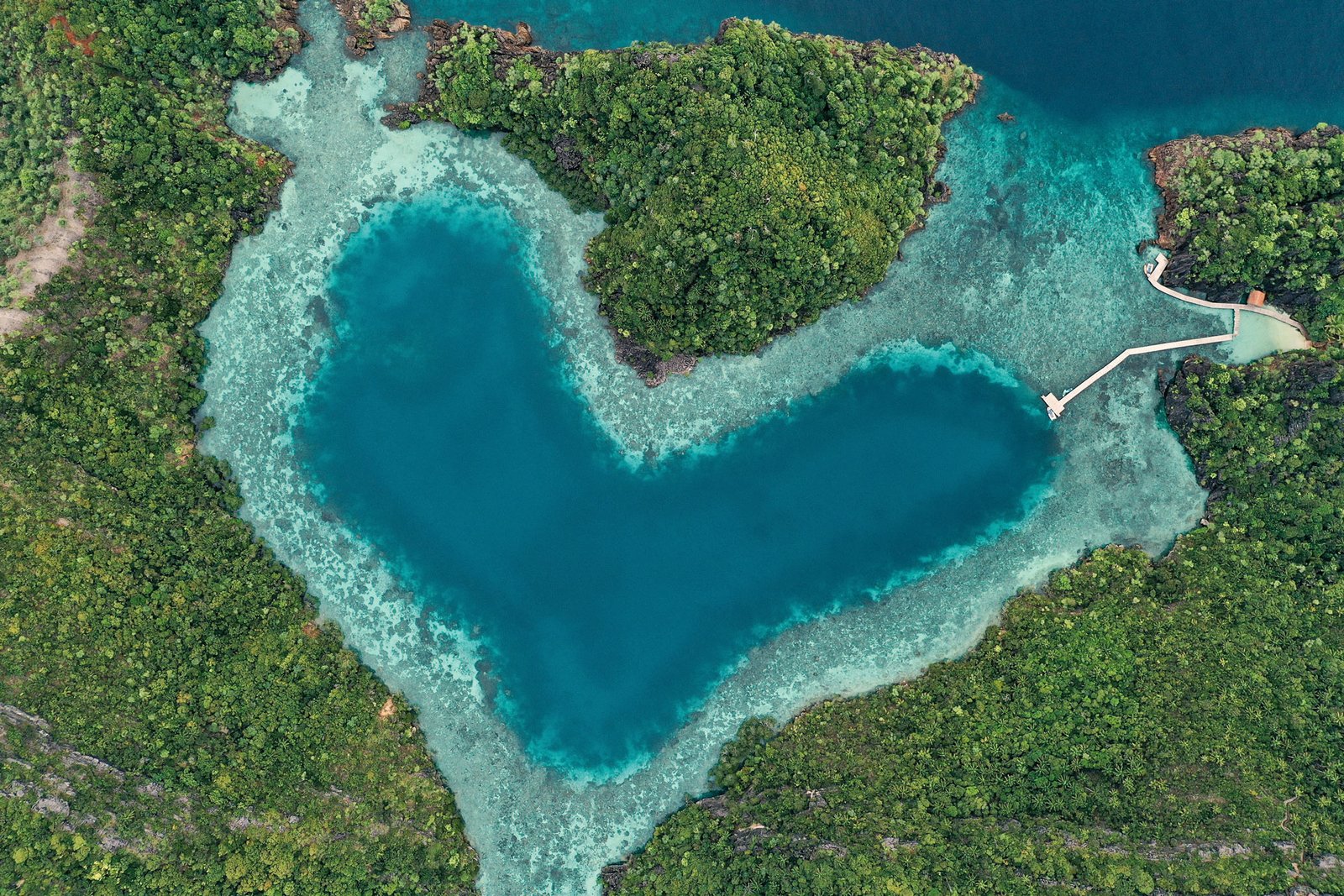 Aerial view of Misool's heart-shaped lagoon, a highlight of Raja Ampat liveaboard snorkeling.